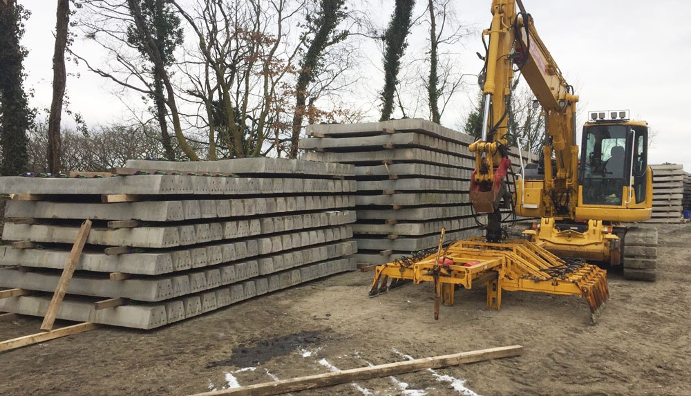 Railway sleepers stacked in piles