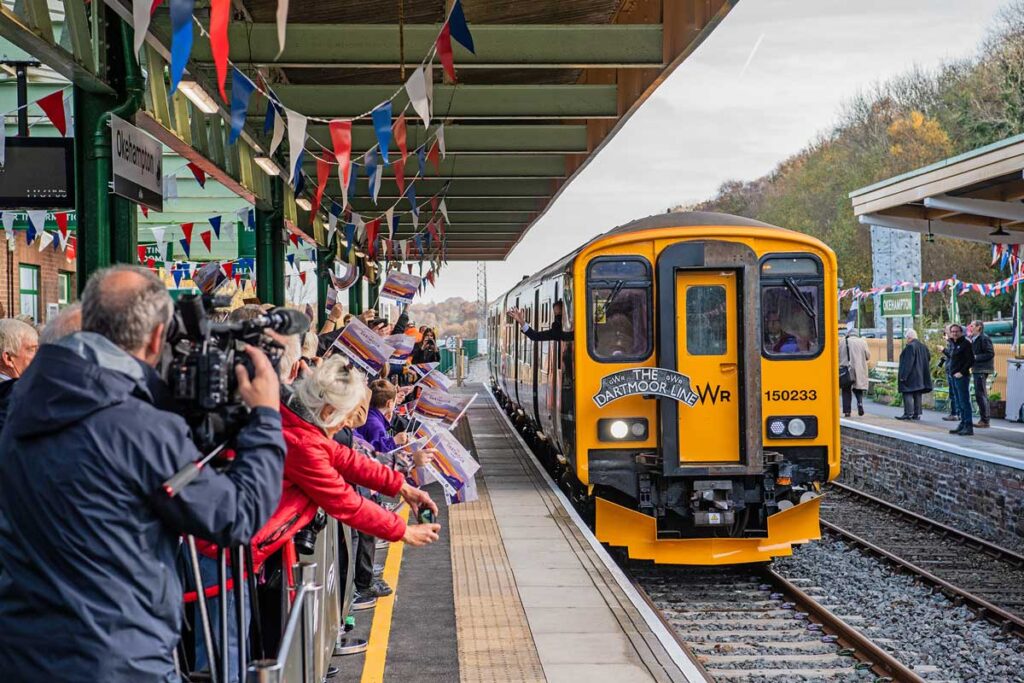 Grant Shapps arrives on train into Okehampton station