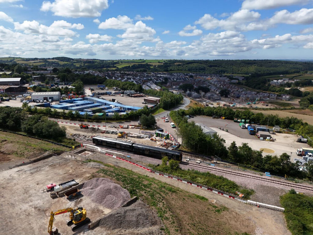Train at the under-construction Okehampton Interchange station
